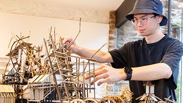 Male student working on an Architecture design project