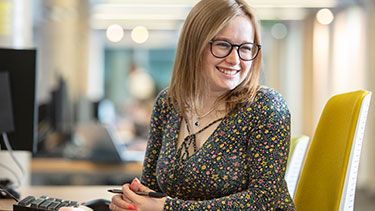 Female student working at desk
