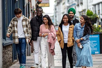 Students walking through Barbican in Plymouth
